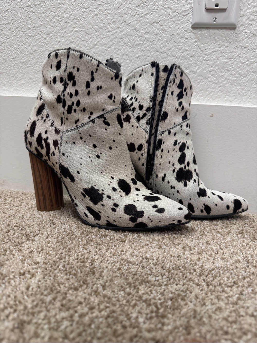 Overland Cow Print Ankle Booties in White and Black